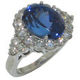 9.12 Ct. TW Oval Cut Tanzanite in Diamond Halo Accented 14 kt. Ring