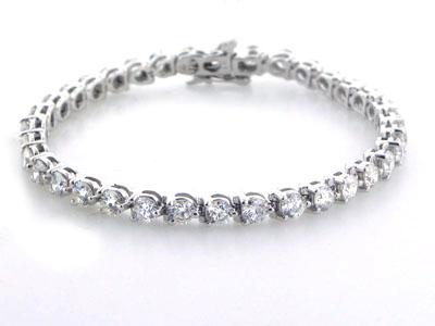 4.50 Ct. TW Round Diamond Tennis Bracelet in 14 kt. Three Prong Mounting