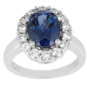 8.85 ct. TW Oval Shape Blue Sapphire in Diamond Accented 14 kt. White Gold Ring